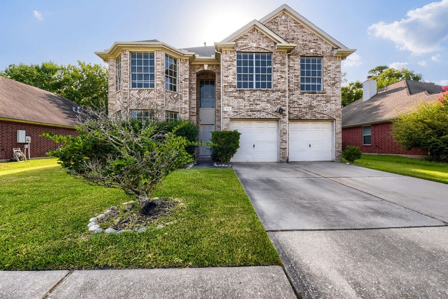 Property photo for 18715 Woodglen Shadows Drive, Humble, TX