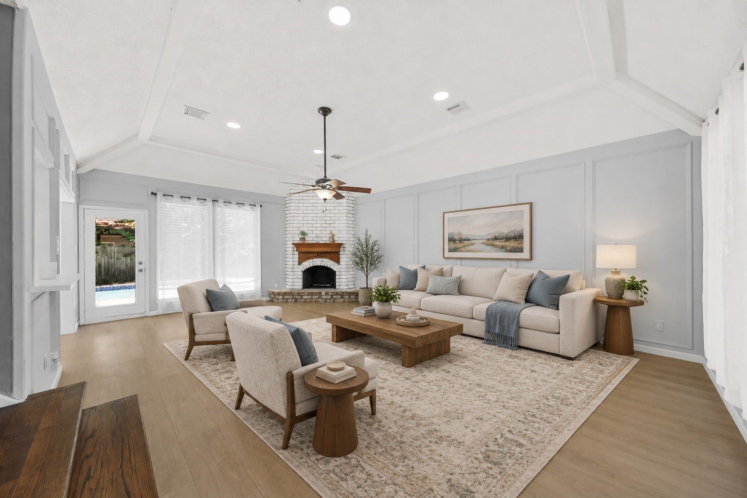 15110 Walters Road, Houston, TX 77068 Virtually Staged inviting transitional living room with fireplace