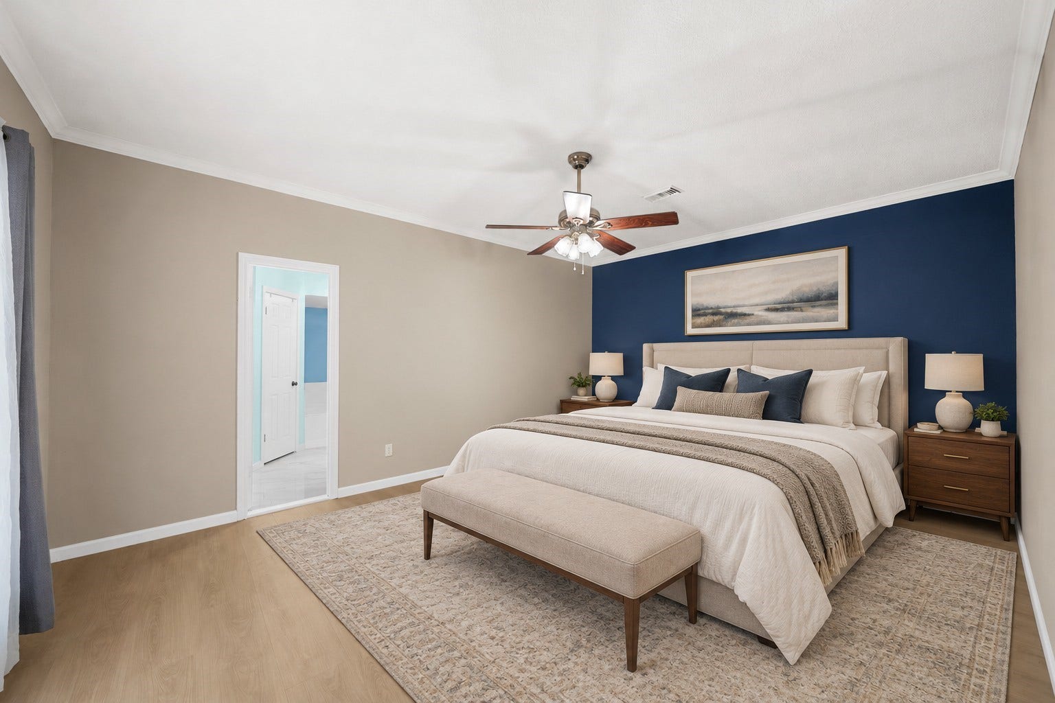 15110 Walters Road, Houston, TX 77068 VS Primary king bed on navy accent wall