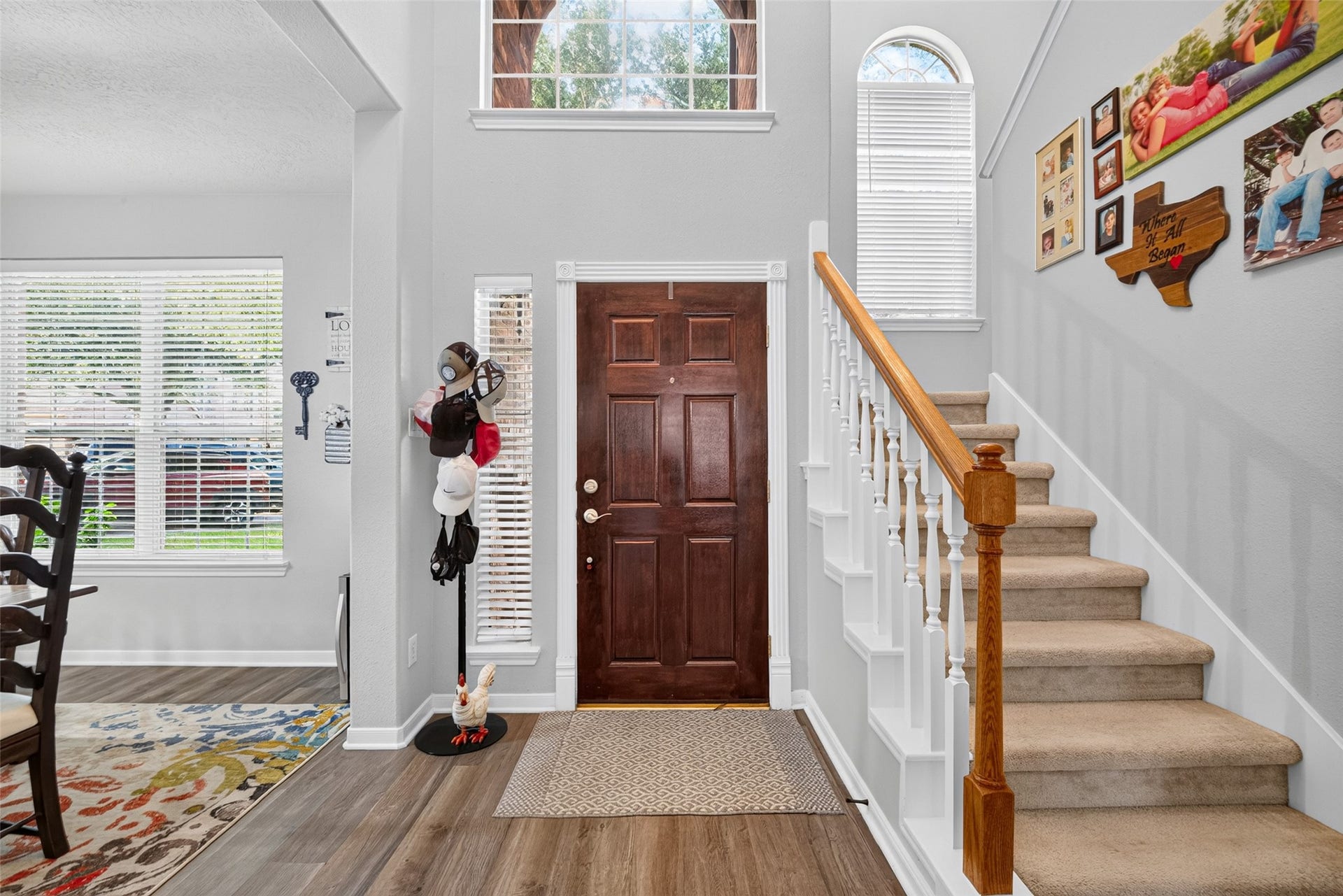 113 Erin Court, La Porte, TX 77571 Bright two-story foyer with staircase quite the first impression.