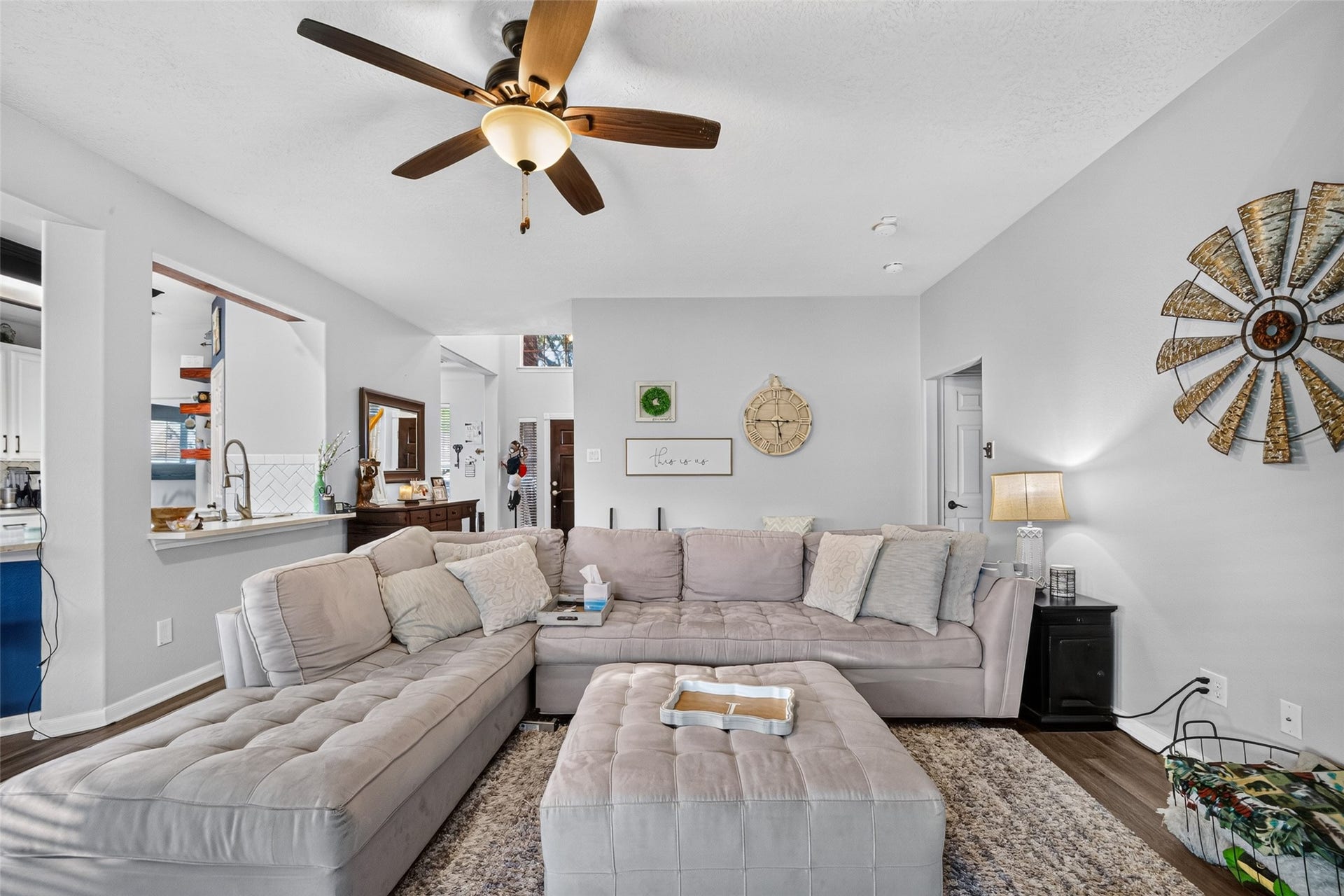 113 Erin Court, La Porte, TX 77571 Airy living room flowing seamlessly toward the kitchen.