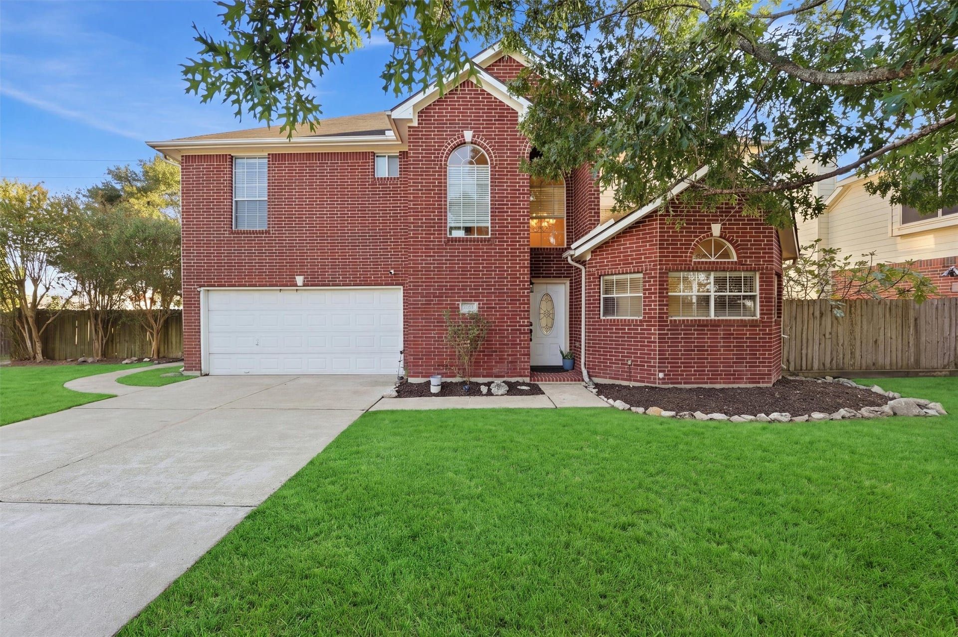 Front elevation.  Grass is digitally altered.