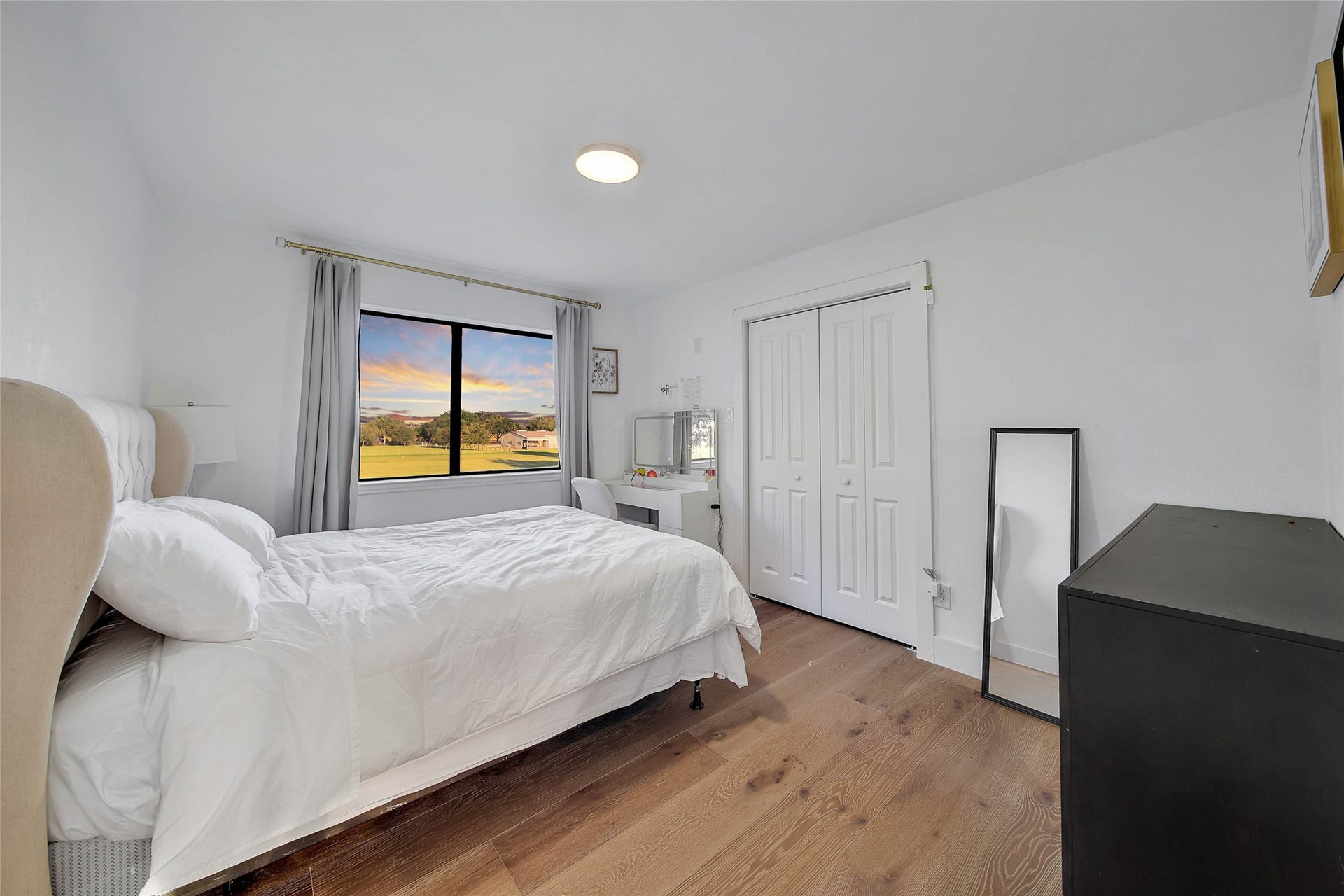 11 W Kitty Hawk ST, Richmond, TX 77406 Bright secondary bedroom provides flexible space for family members or overnight guests.