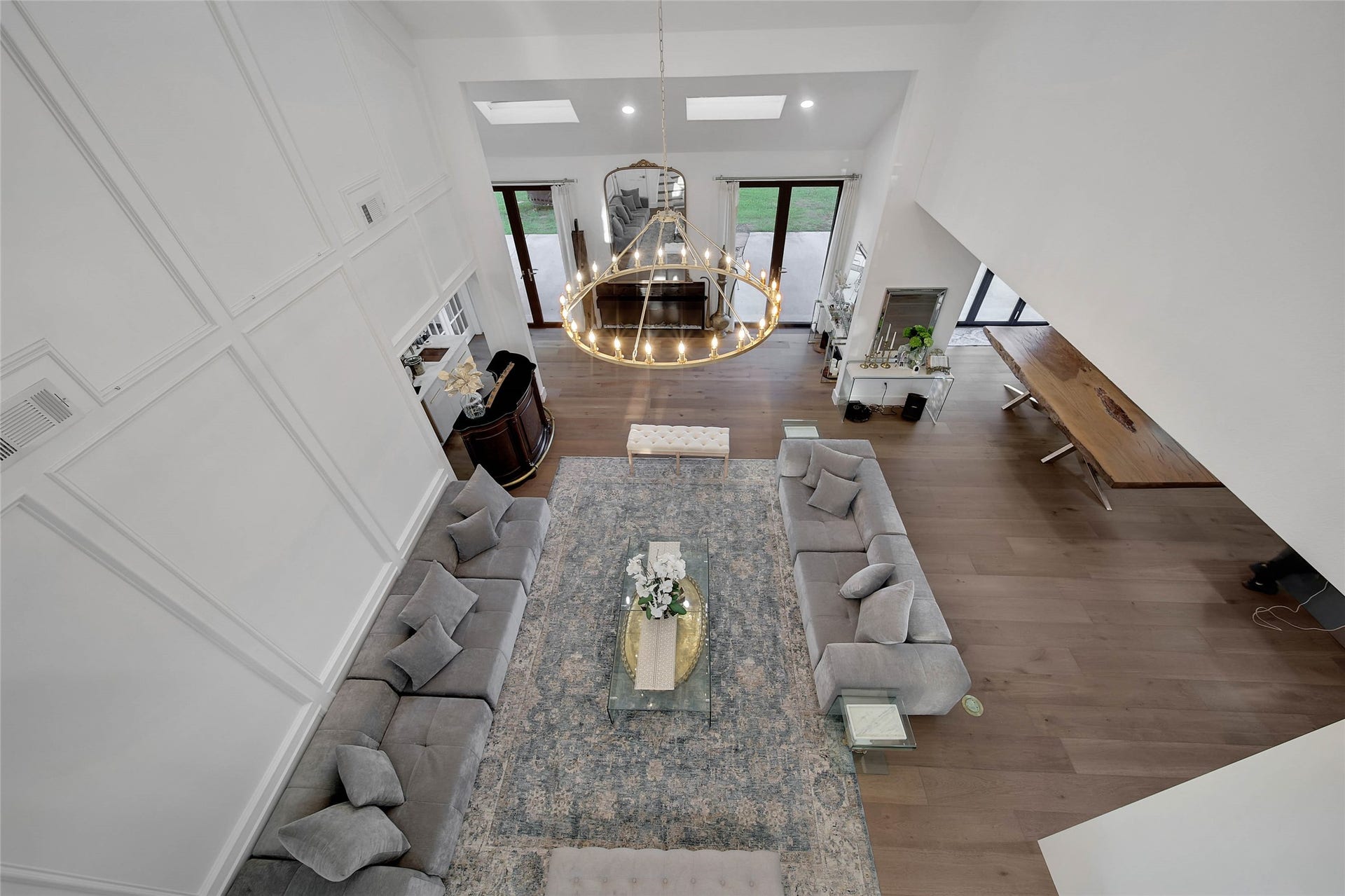 11 W Kitty Hawk ST, Richmond, TX 77406 Open upper-level overlook emphasizes the scale and dramatic two-story design of the main living area.