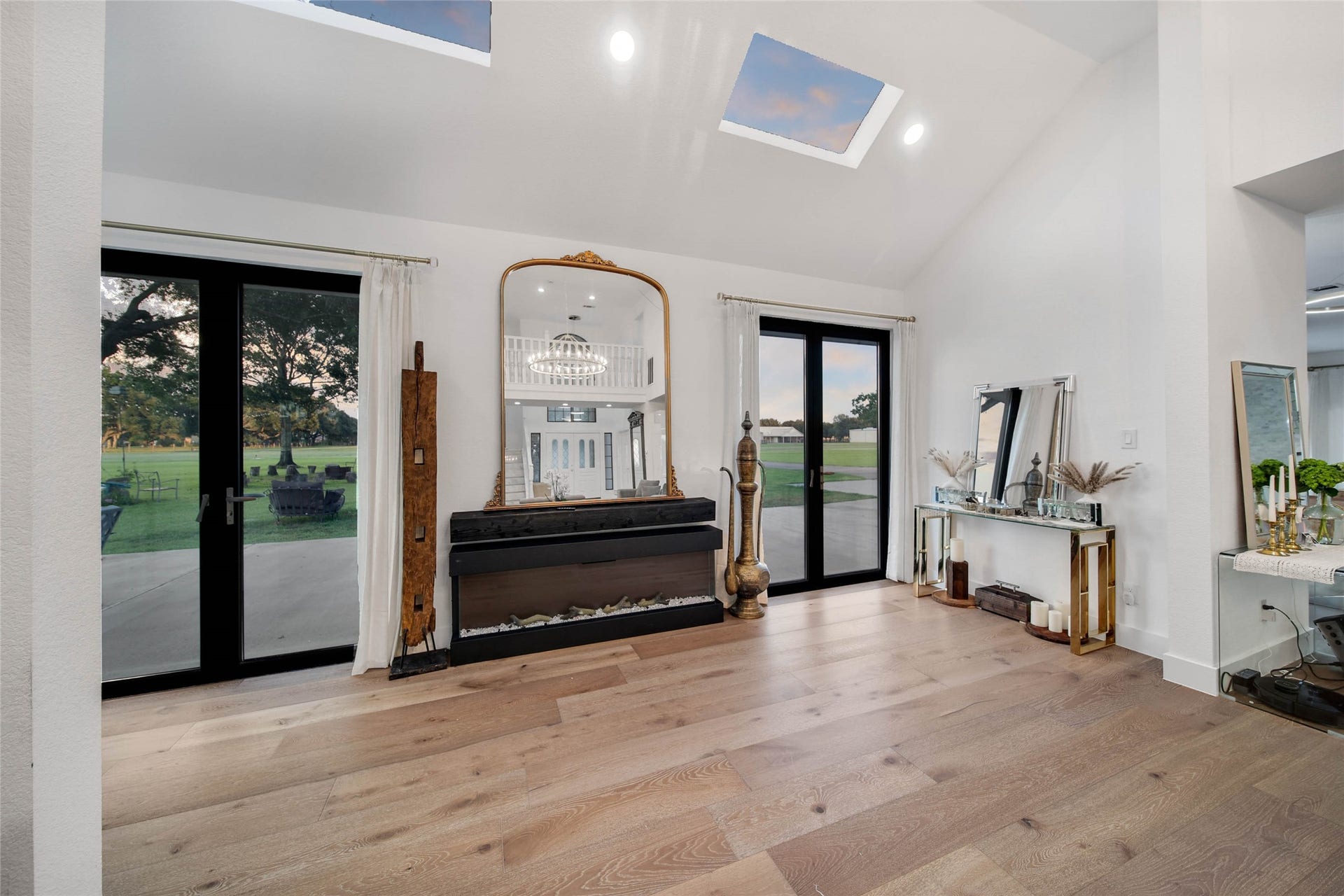 11 W Kitty Hawk ST, Richmond, TX 77406 Expansive glass doors visually connect the interior living spaces with the backyard and outdoor entertaining areas. Modern and elegant fireplace, gas conection already installed