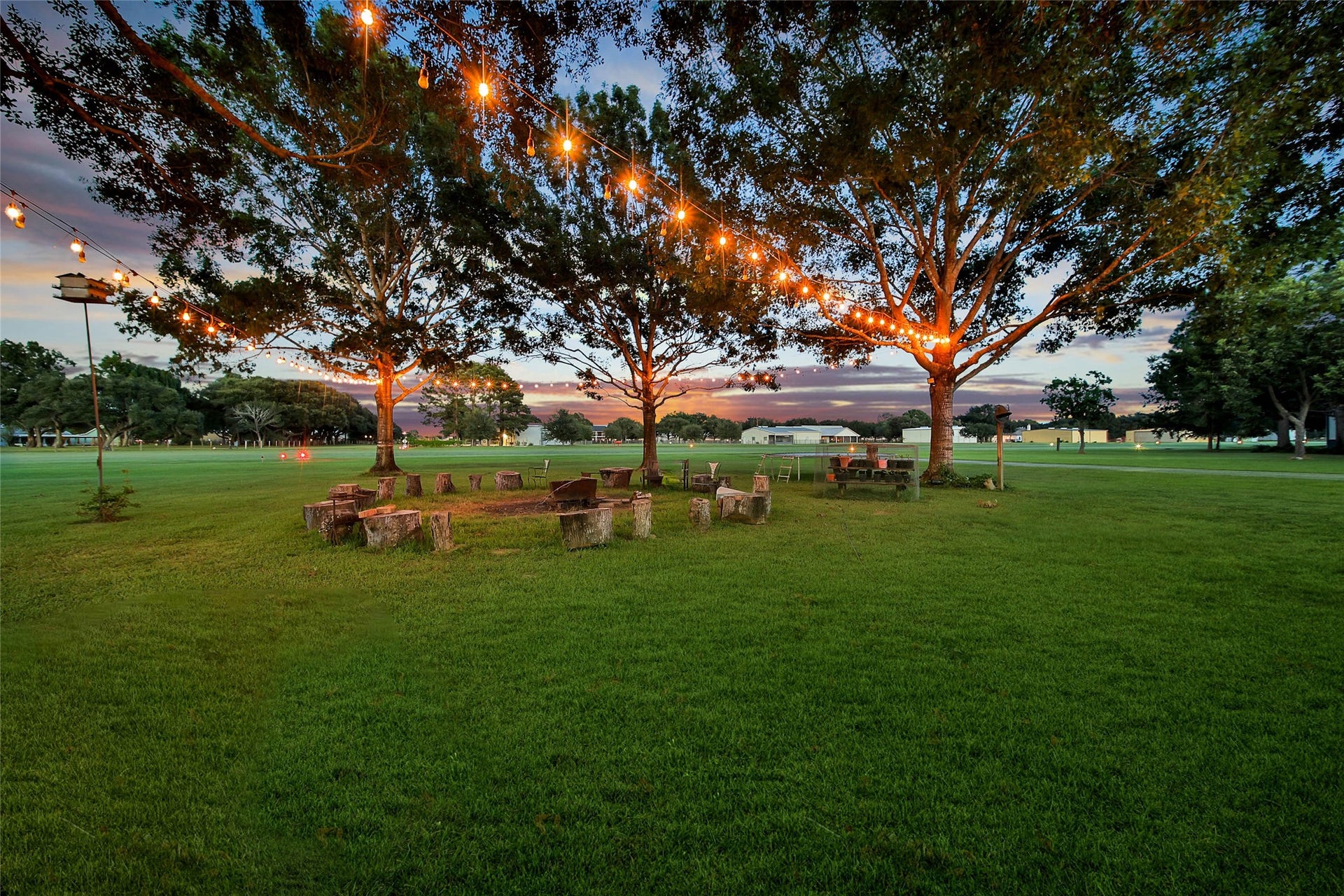 11 W Kitty Hawk ST, Richmond, TX 77406 Mature trees and expansive lawn create a peaceful outdoor setting with remarkable open-space views.