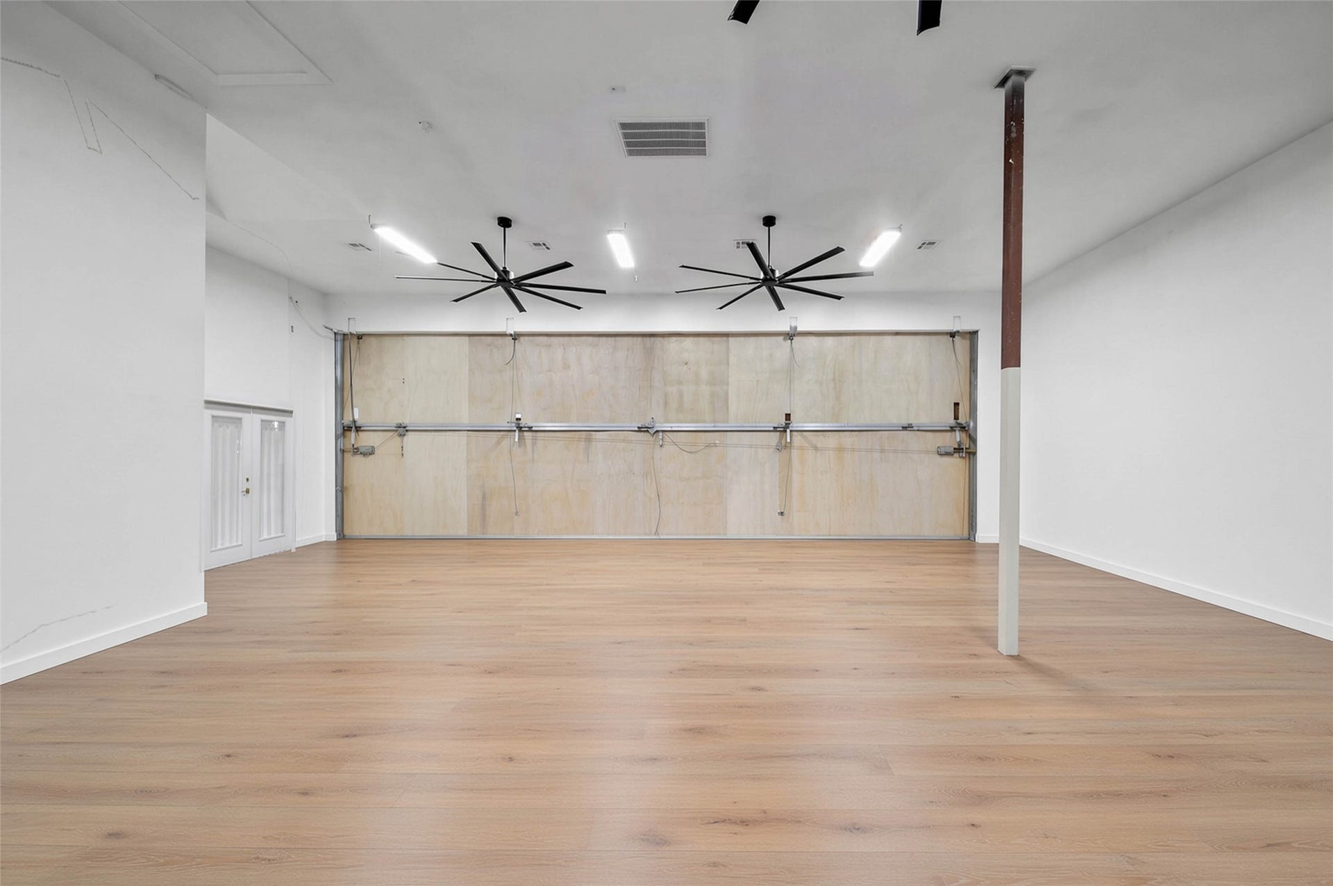 11 W Kitty Hawk ST, Richmond, TX 77406 Hangar configuration includes extensive open floor area plus additional functional space for aviation-related needs.