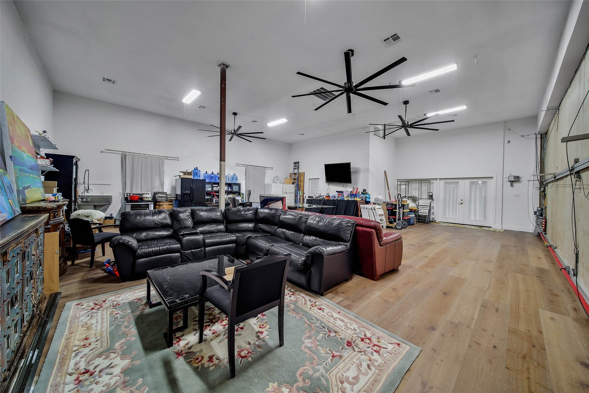 11 W Kitty Hawk ST, Richmond, TX 77406 Private hangar features exceptional interior volume and flexibility for aircraft, vehicles, equipment or recreational use.