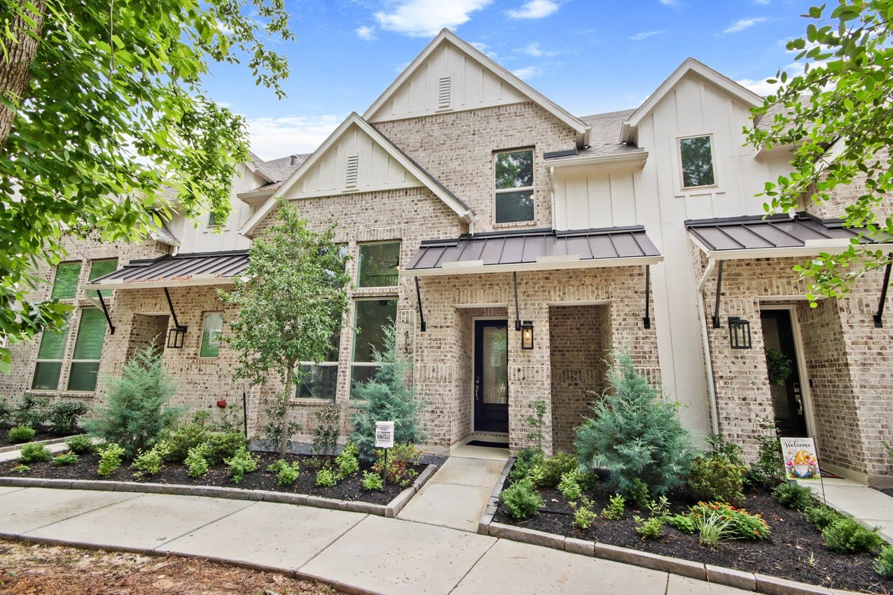 413 Meadows Peak Lane, Montgomery, TX 77316 Beautiful brick exterior and landscaping walking up to 413 Meadows Peak
