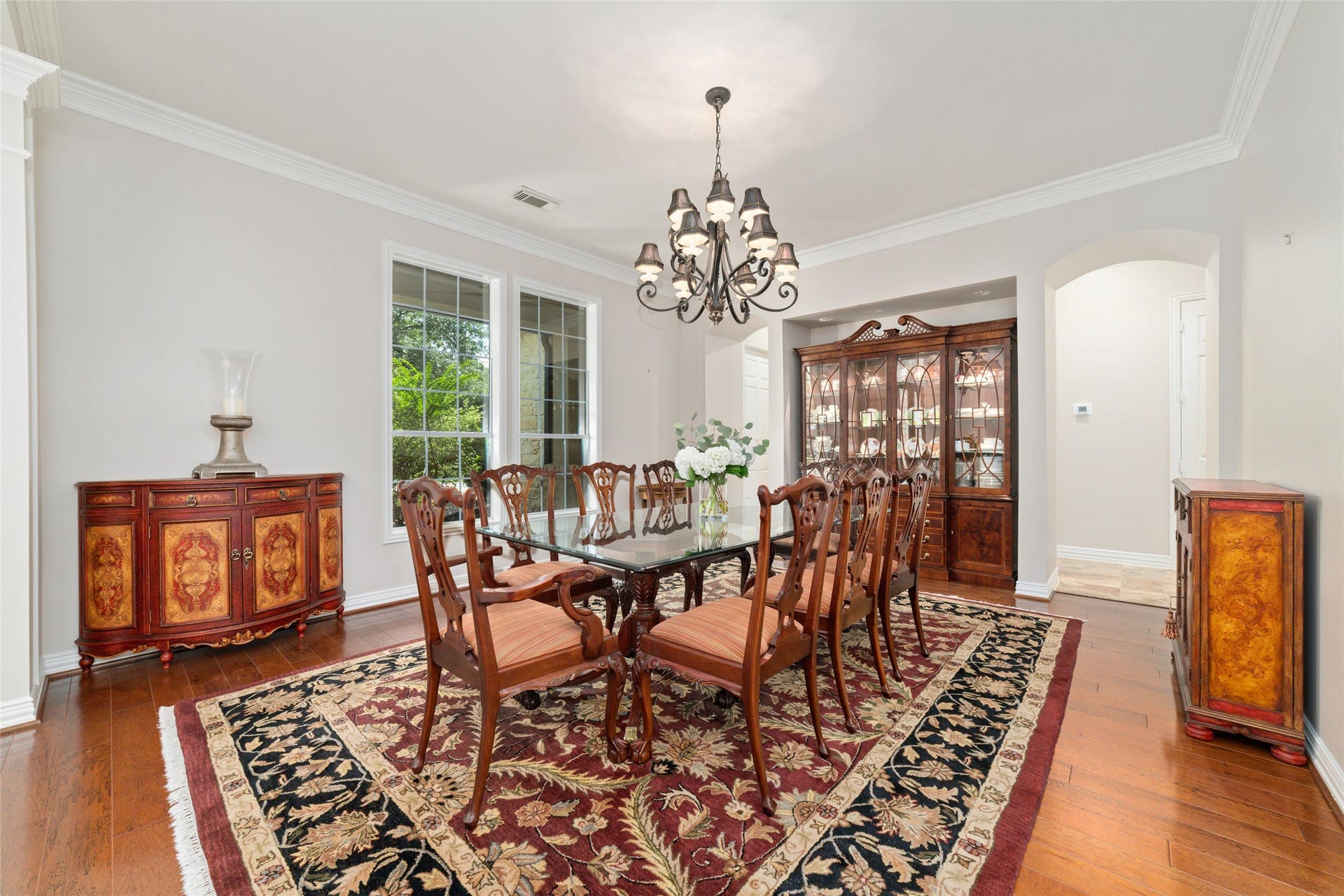 Formal dining withhardwood floors and a big window that lets in plenty of natural light, making it a great spot for meals and get-togethers.