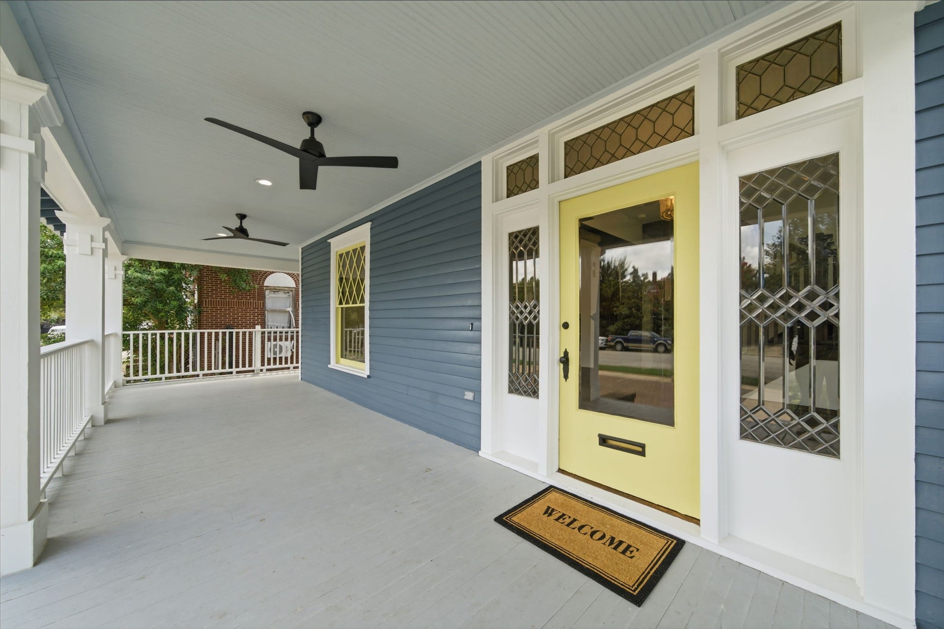 404 Avondale Street, Houston, TX 77006 Original intricate glass detailing, perfect for welcoming guests.
