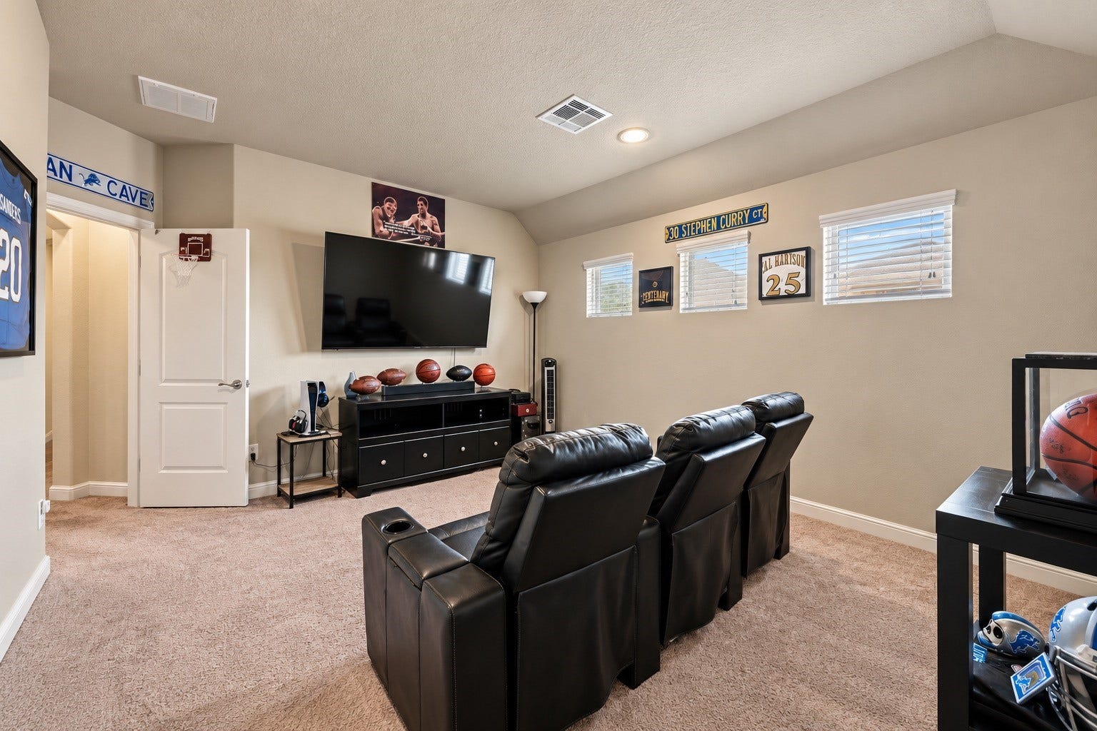 Experience ultimate entertainment in this cozy home theater or make it an additional room! You have options here!