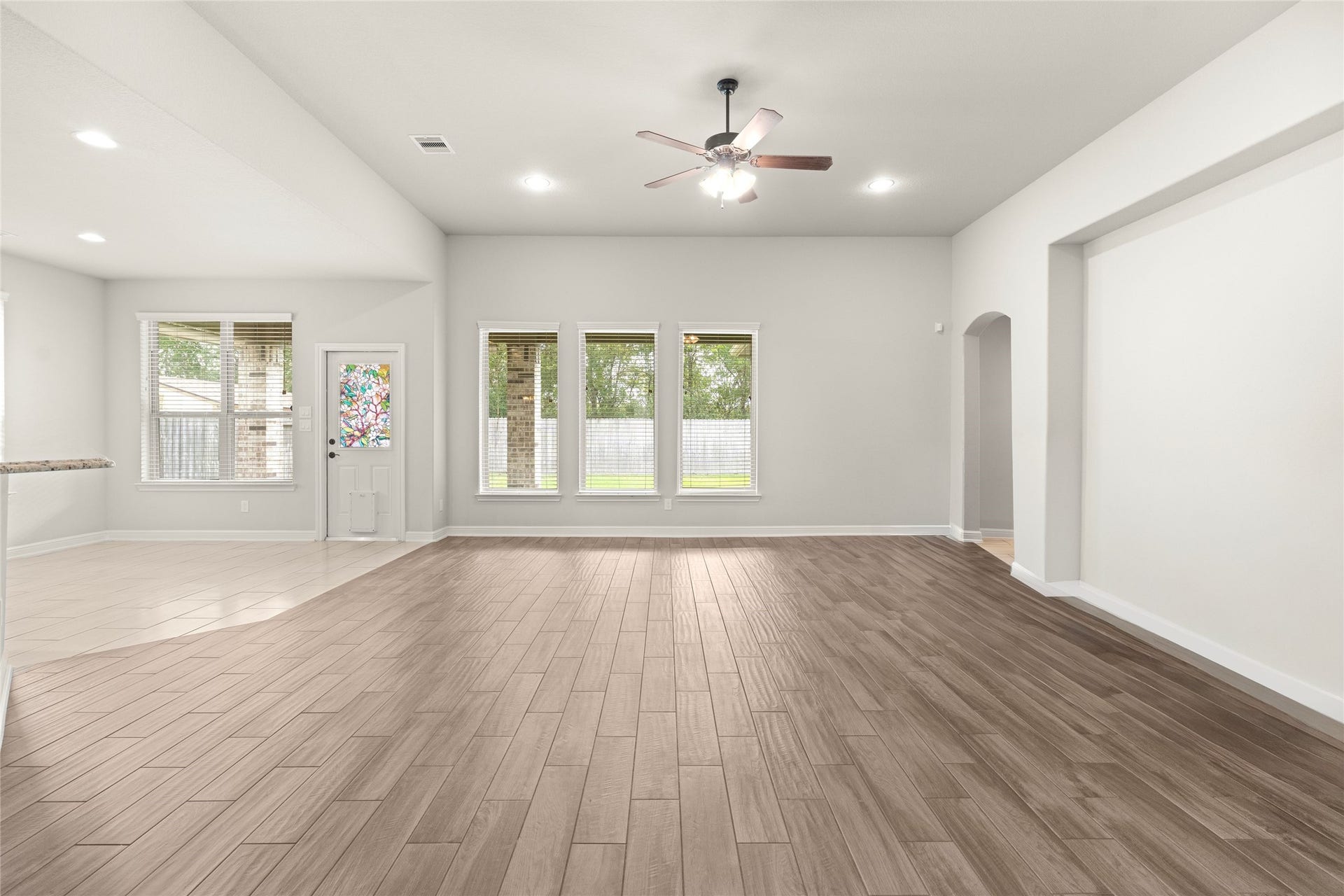 3015 Dawn Light Drive, Rosenberg, TX 77471 Spacious living room with tons of natural light and attached breakfast room.
