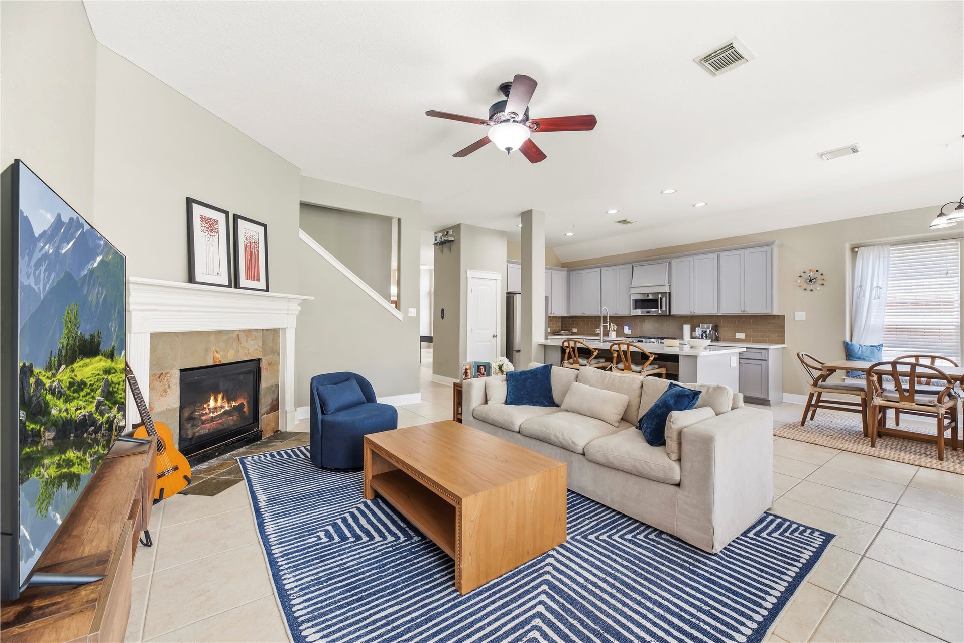 20918 Field Manor Lane, Katy, TX 77450 Open concept living room flows seemlessly into the kitchen for entertaining.