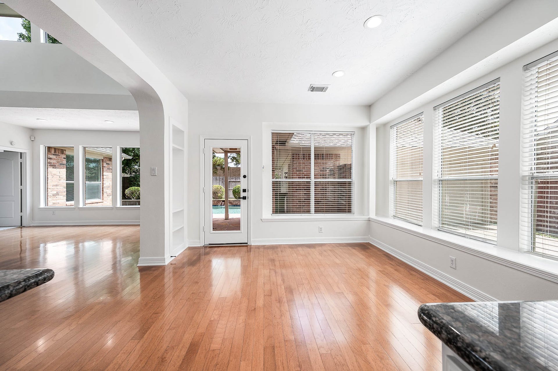 12119 Cielio Bay Lane, Houston, TX 77041 Breakfast area with backdoor access to pool