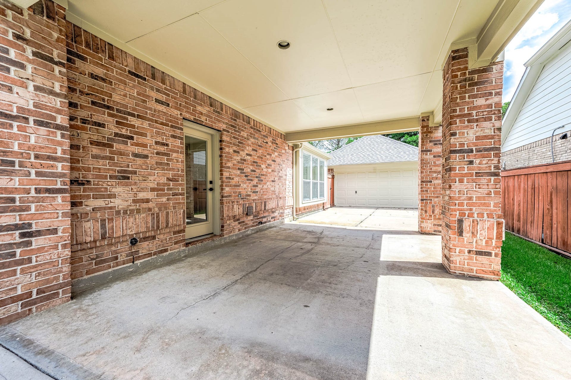 12119 Cielio Bay Lane, Houston, TX 77041 spacious outdoor carports that could be used for more car parking or other outdoor activities
