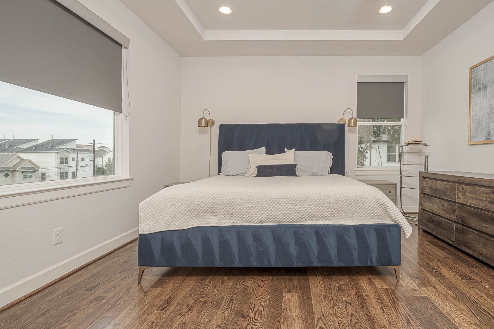 1615 Bingham Street, Houston, TX 77007 Nestled on the third floor, the primary bedroom offers a serene retreat with elegant finishes and abundant natural light.