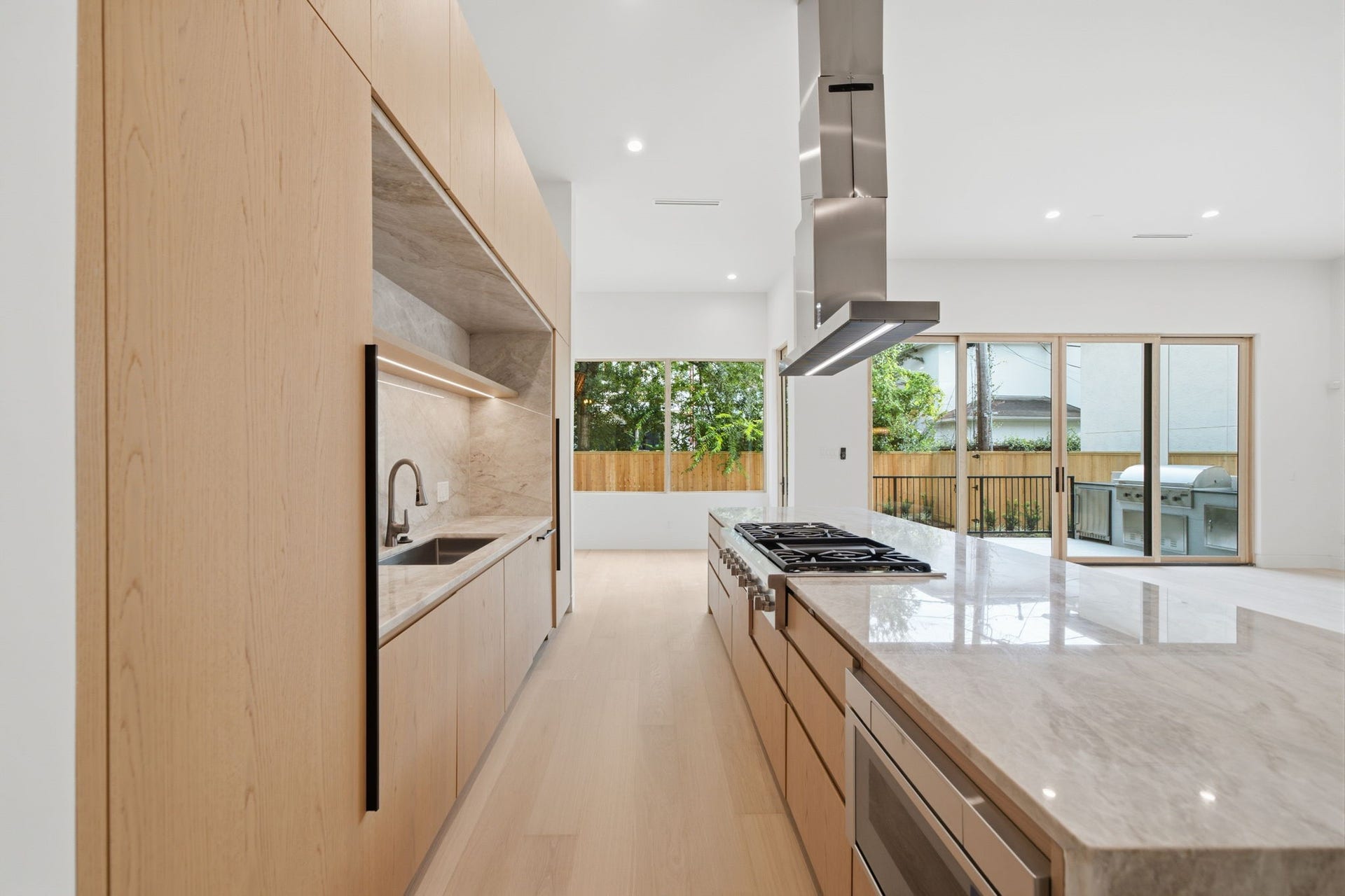 3023 Nottingham Street, West University Place, TX 77005 The kitchen and entire home is embraced with exceptional natural light and wood tones