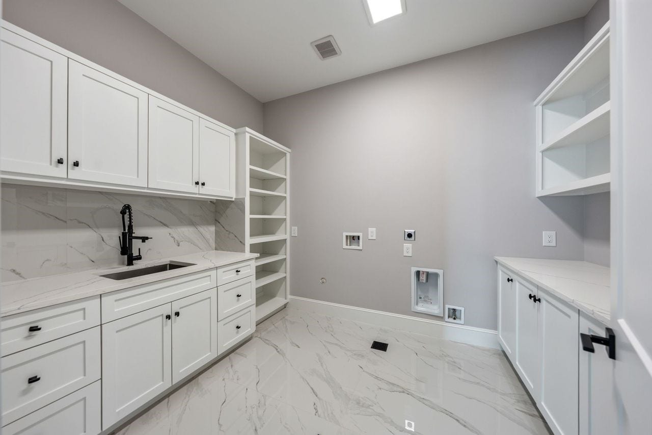 2046 MacArthur Street, Houston, TX 77030 Utility room conveniently located upstairs near all bedrooms.