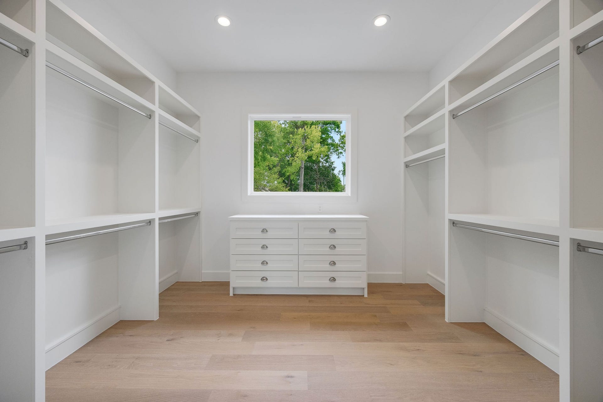 1726 Saxon Drive, Houston, TX 77018 Generous primary closet with beautiful natural light streaming in and tree-top views.