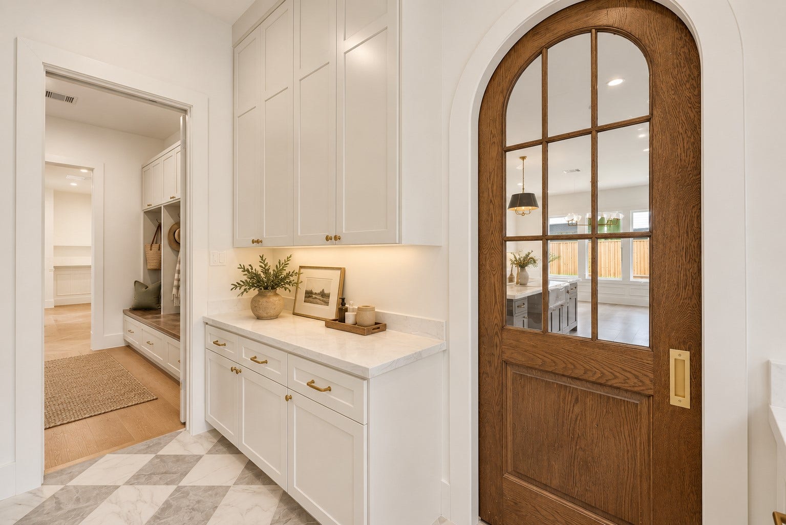 1726 Saxon Drive, Houston, TX 77018 View of the scullery/prep kitchen with a peek into the mud room - notice the character the arched door provides.