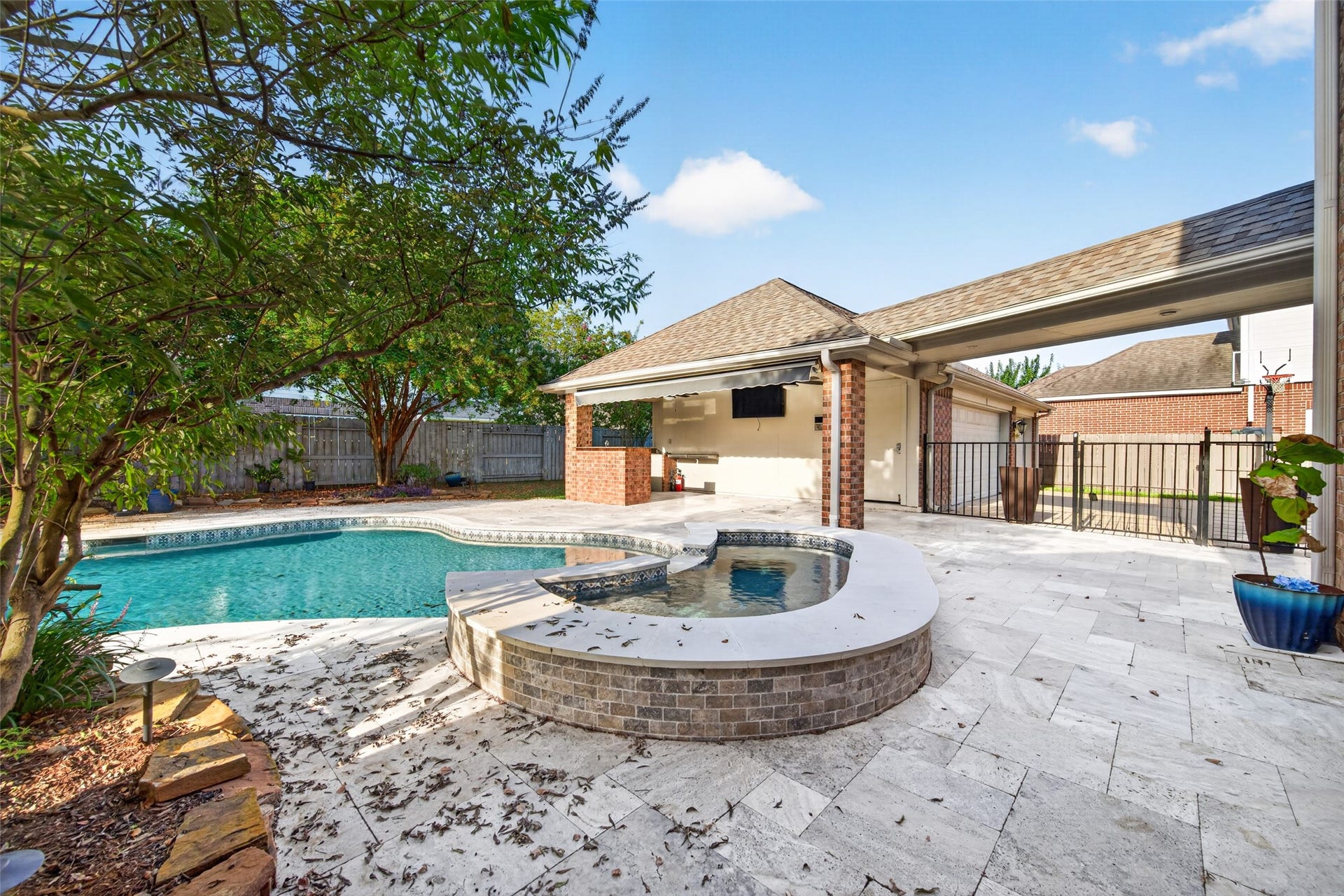 11603 Island Breeze Street, Pearland, TX 77584 Who is ready to cool off? Covered walkway between house and grill area means no soggy burger buns:)