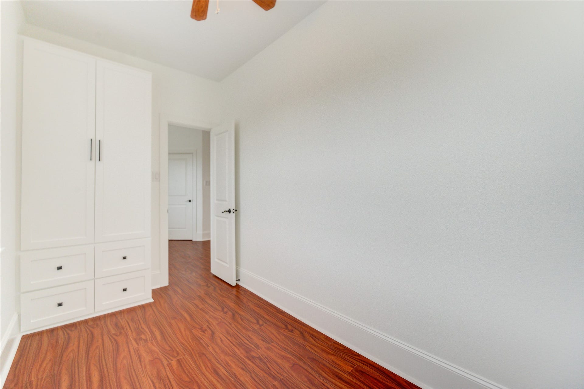 27715 Guthrie Ridge Ln, Katy, TX 77494 Thoughtfully designed upstairs storage with built-in shelving and ample closet space.