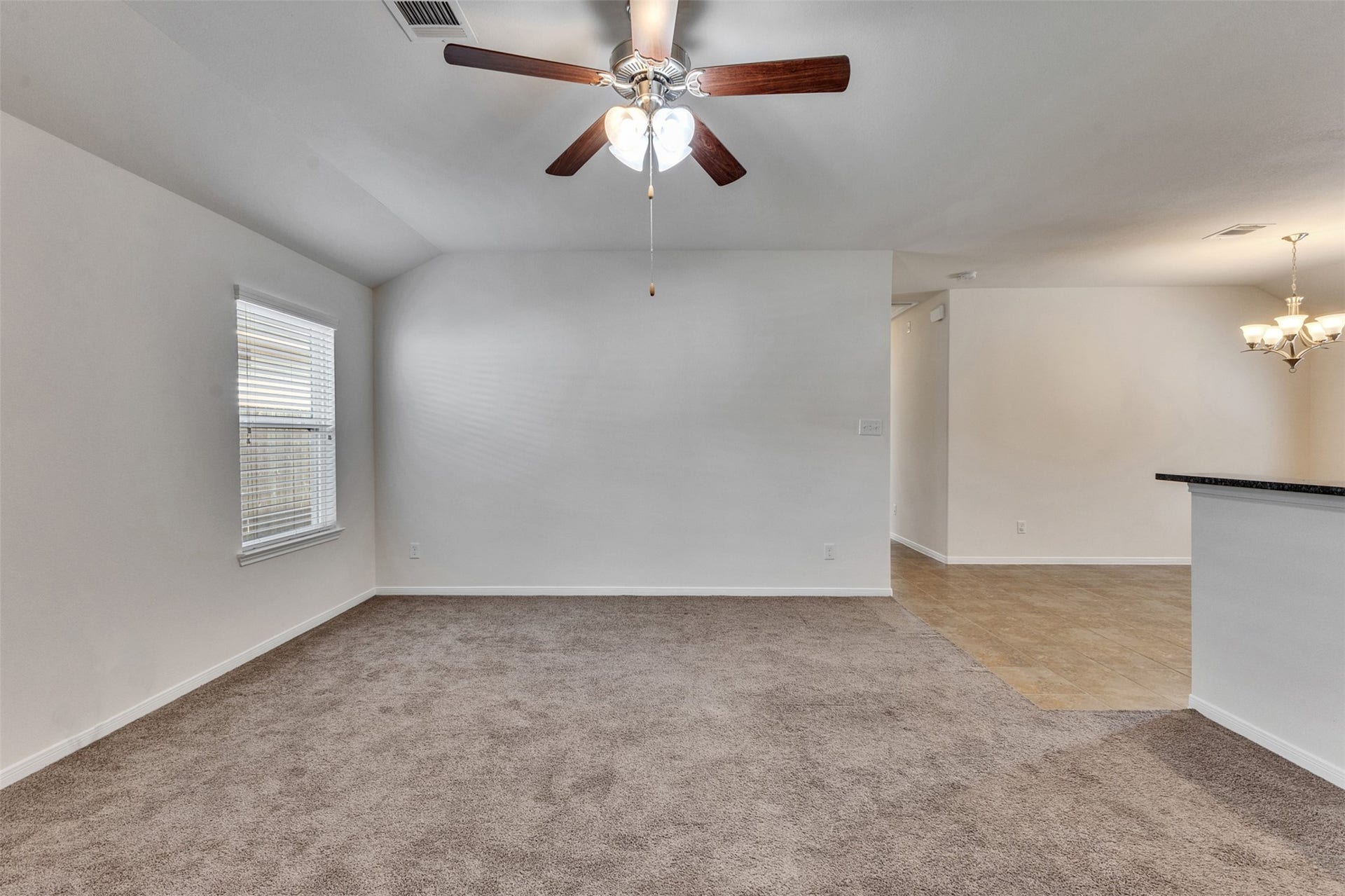 12915 Almeda Crossing Court, Houston, TX 77048 Spacious living area with abundant natural light and an open-concept design.