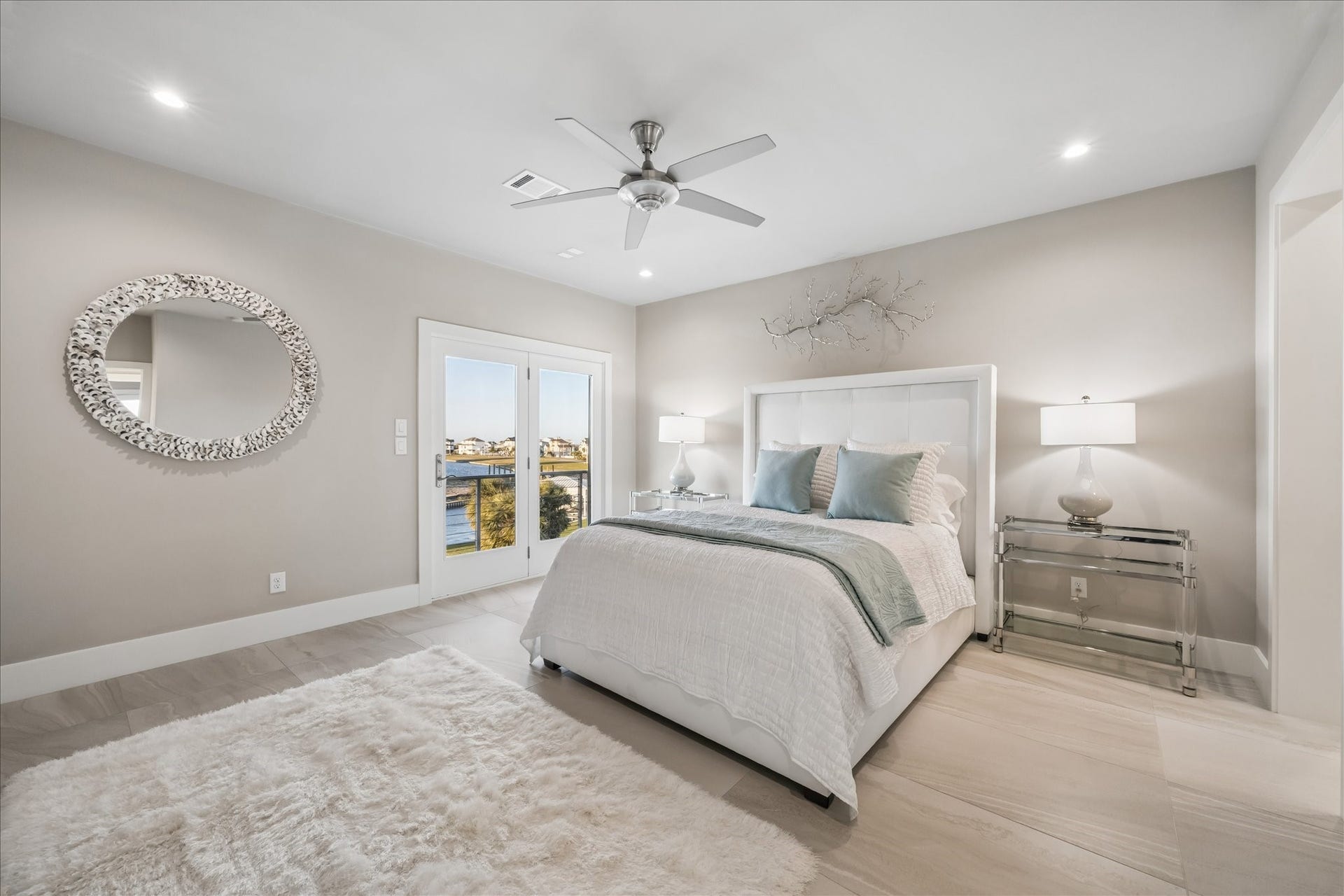 1 Water Key, Hitchcock, TX 77563 The second guest bedroom offers access to front balcony and a Jack & Jill bathroom