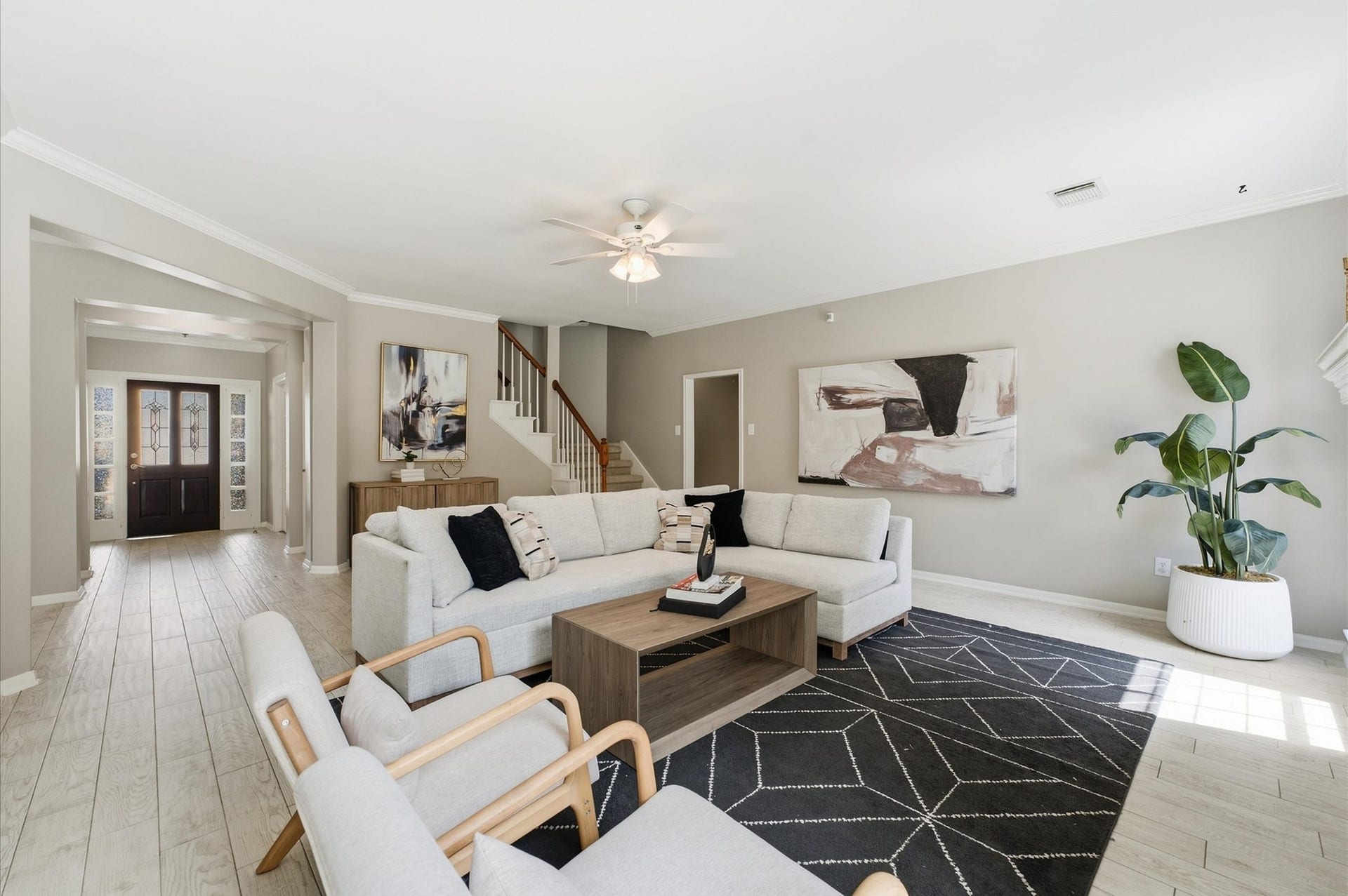 3010 Peekskill Court, Pearland, TX 77584 Living room is open to the kitchen, with plenty of space to relax or entertain.