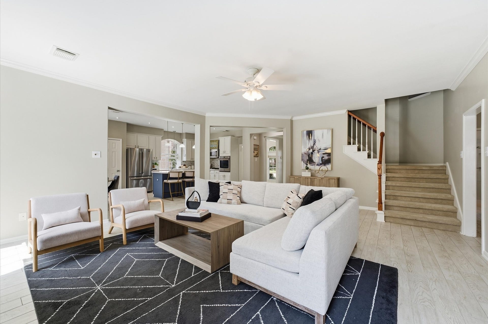 3010 Peekskill Court, Pearland, TX 77584 Living room is open to the kitchen, with plenty of space to relax or entertain.