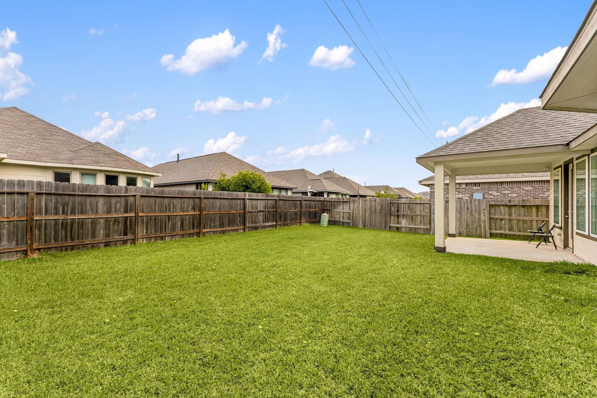 20422 Alpine Meadow Place, Richmond, TX 77407 A huge, fully fenced backyard with endless room to run, garden, or relax outdoors.