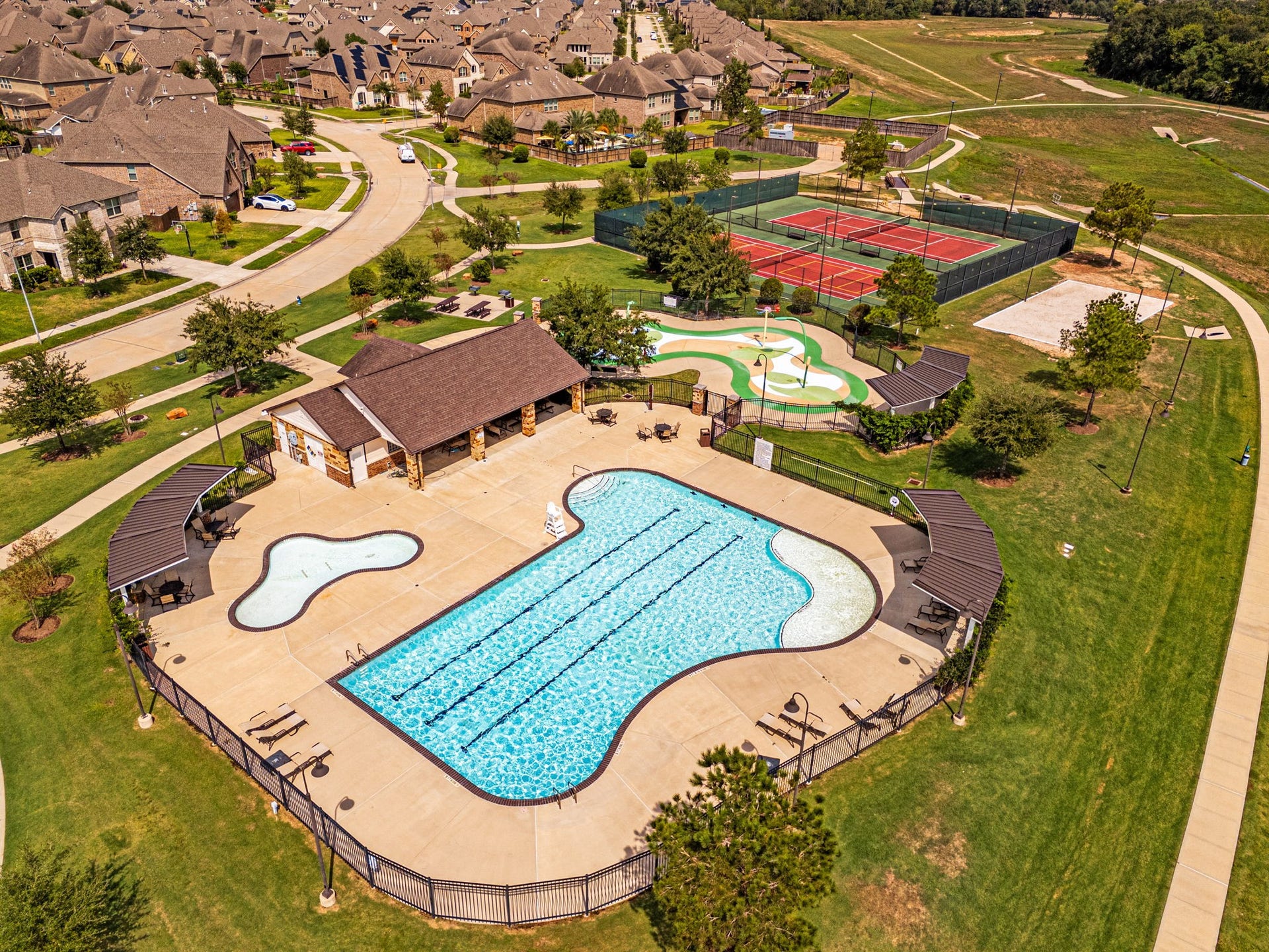 At Trails of Katy, residents enjoy a beautifully maintained community swimming pool with open green viewsperfect for lap swimming, cooling off on warm Texas days, or relaxing poolside. A refreshing extension of the neighborhoods active, outdoor-focused lifestyle....