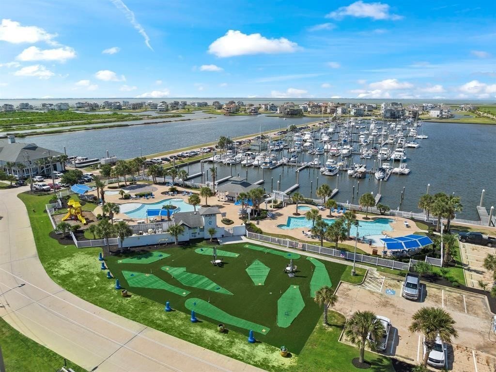 13 Sugarloaf, Hitchcock, TX 77563 Embrace the ultimate coastal lifestyle at Harborwalk, where a resort style pool facility with a Flamingo Bar, a fun putt-putt area, and a bustling full-service marina with luxury yachts and boat launch create a perfect seaside escape.