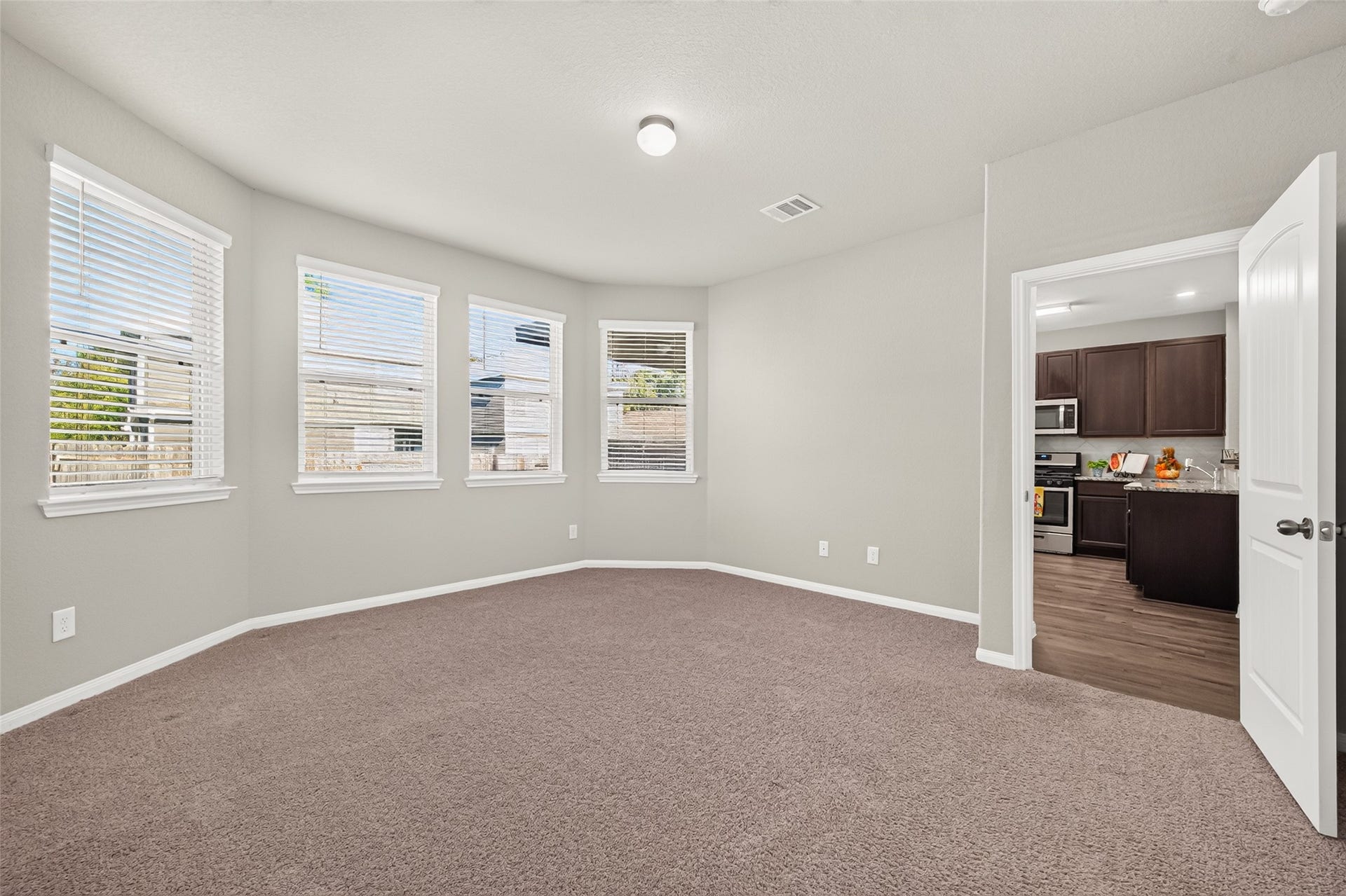 13405 Cannon Creek Court, Willis, TX 77378 Multiple windows allowing natural light! Sitting nook.