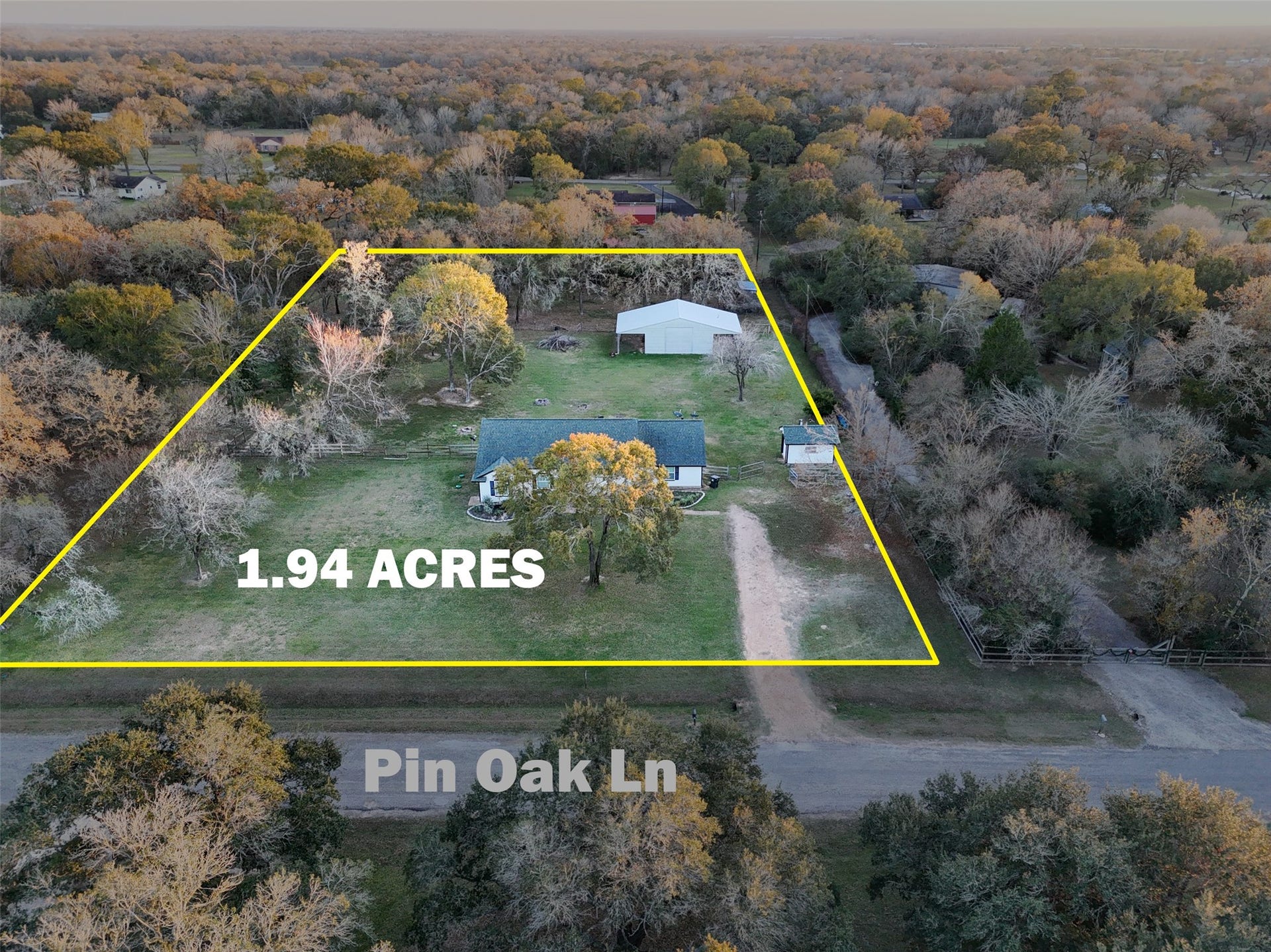 Approx. 1.94 acres outlined, showing road frontage on Pin Oak Lane and usable land layout.
