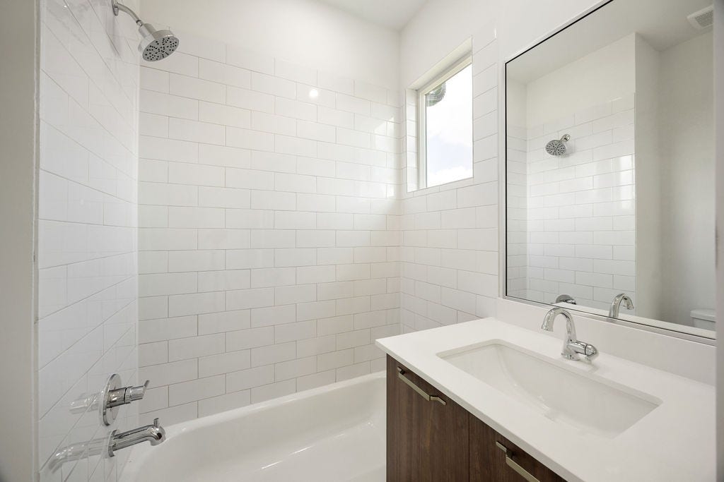 Well appointed secondary full bathroom conveniently located near the bedrooms.