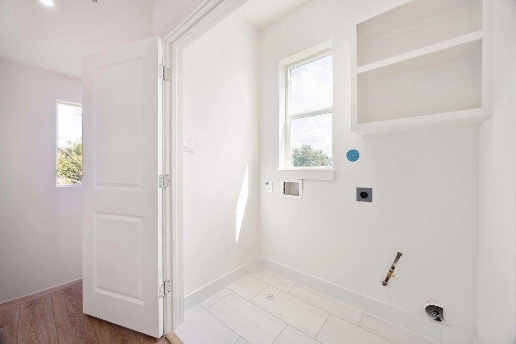 Comfortable third floor secondary bedroom with great natural light.