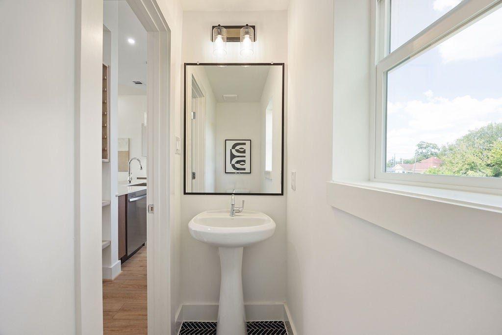 Conveniently located second floor powder room for guests.