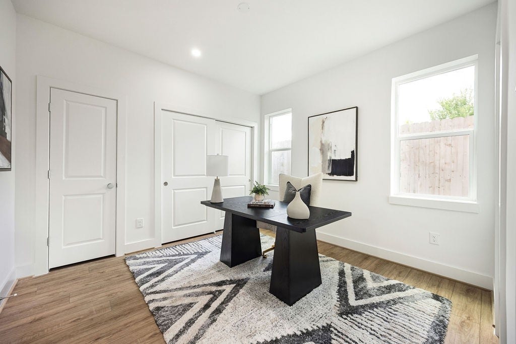 Spacious first floor secondary bedroom with a generous closet.