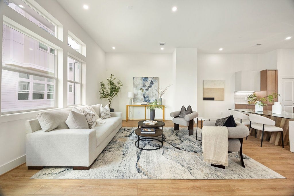 Bright and inviting second floor living area, ideal for relaxing or entertaining.