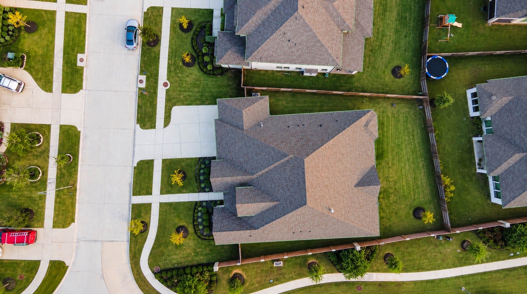 4839 Summer Place Court, Fulshear, TX 77441 Nestled in a serene neighborhood, this spacious property boasts a beautifully manicured lawn and ample outdoor space, perfect for family activities and relaxation.