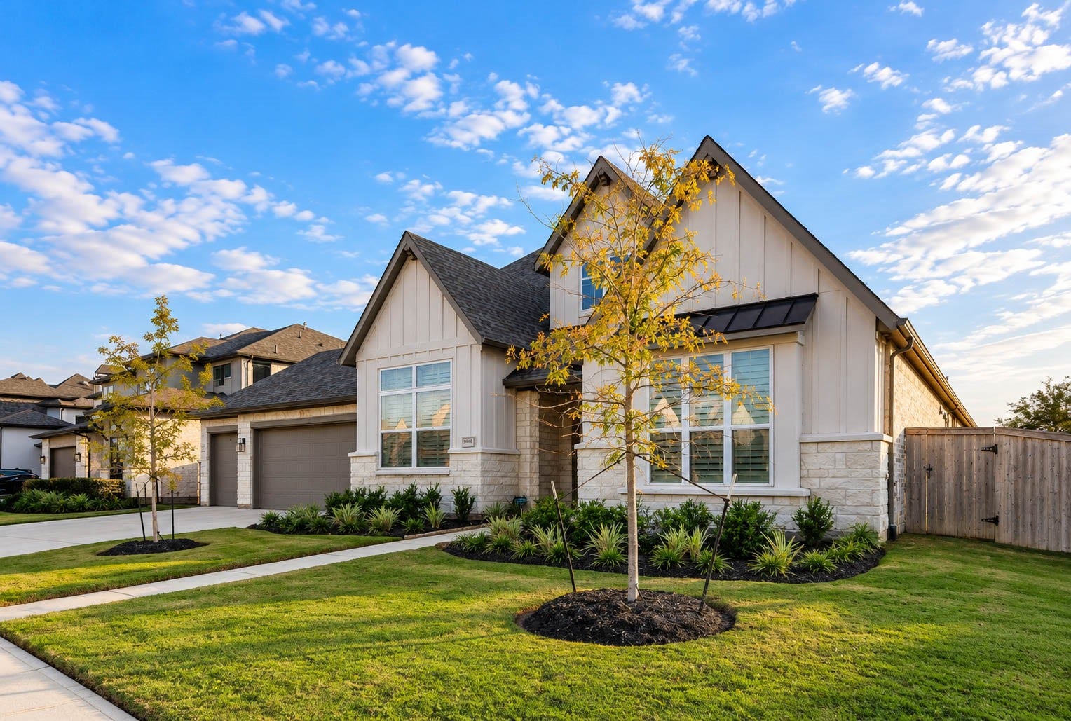 4839 Summer Place Court, Fulshear, TX 77441 Charming modern home with a stone and stucco exterior, featuring a well-manicured lawn and inviting curb appeal.
