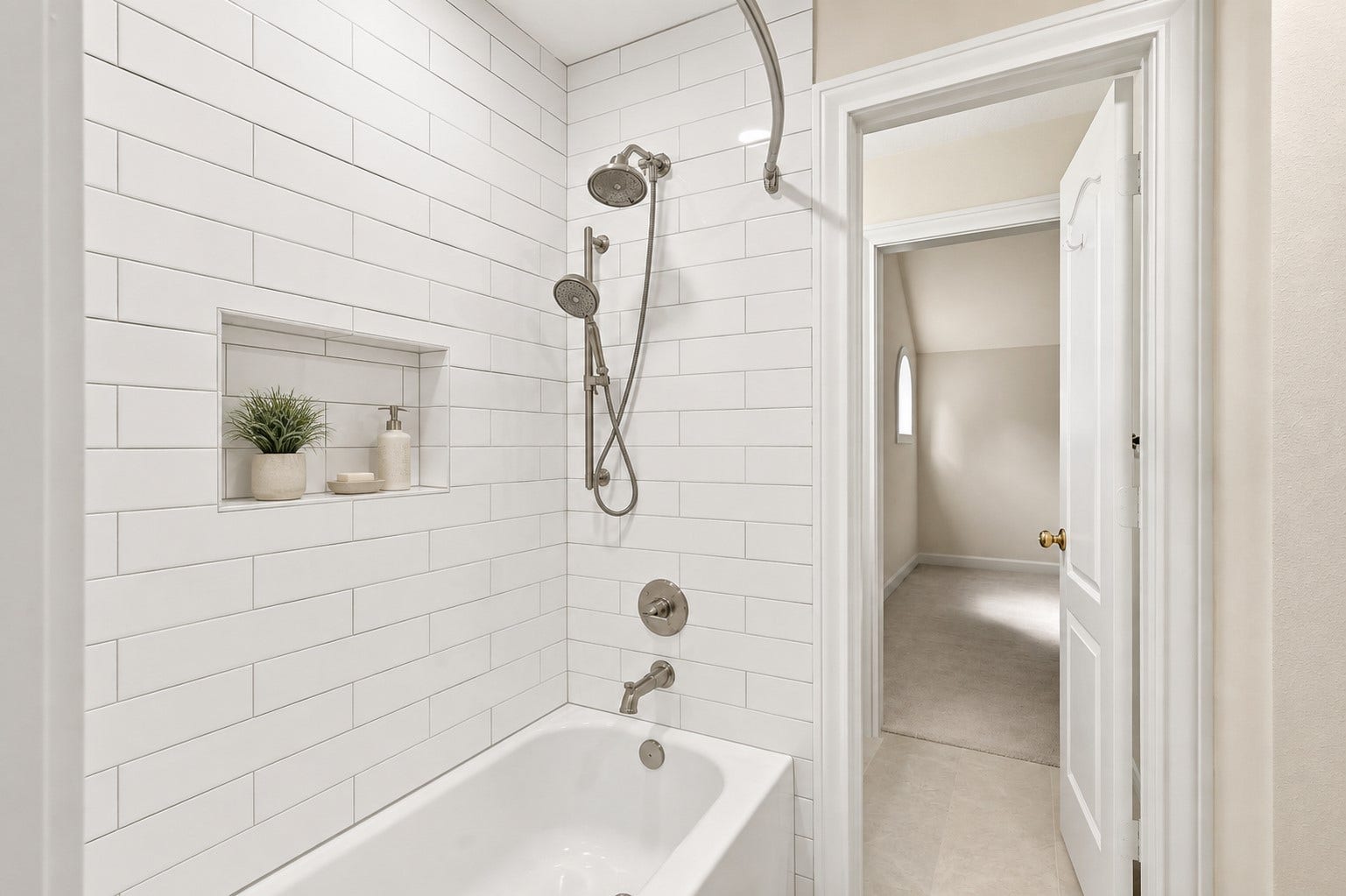 7 Pastoral Pond Circle, The Woodlands, TX 77380 Virtually staged Shared Shower of Hollywood bath with subway tile