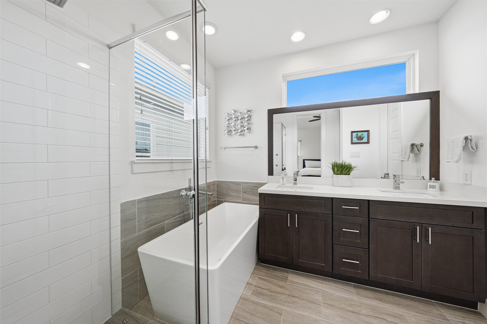 Primary bathroom with separate shower, soaking tub and double sinks.