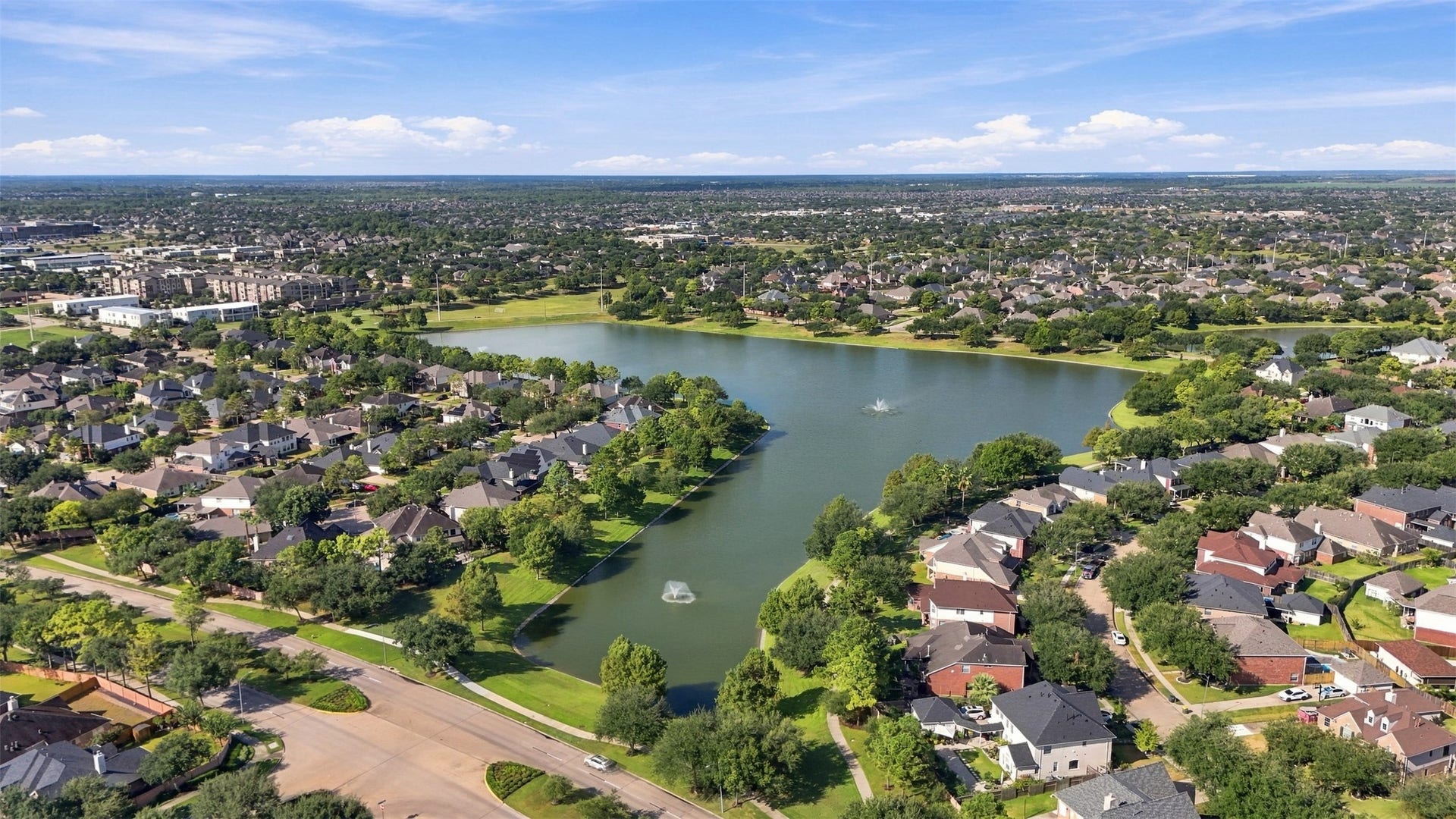 11404 Summit Bay Drive, Pearland, TX 77584 Shadow Creek Ranch boasts 19 scenic lakes, ideal for enjoying a morning jog just steps from your doorstep.