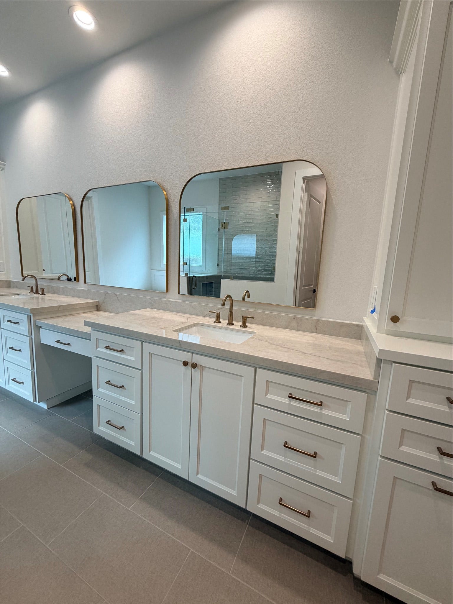 1727 South Pointe, Friendswood, TX 77546-5391 Primary Bathroom with pull out trash can and hair tool drawers