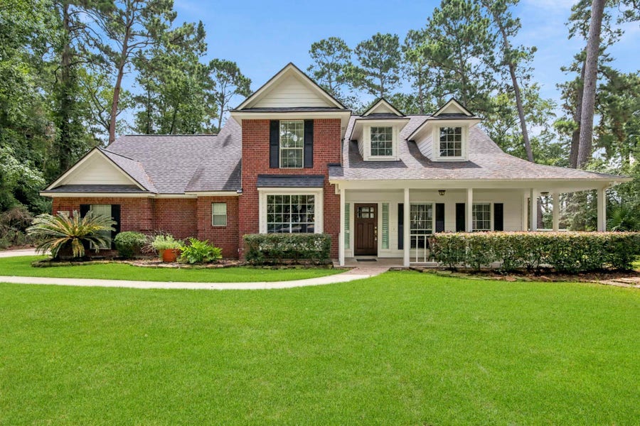Property photo for 14 Creek Forest Lane, Conroe, TX