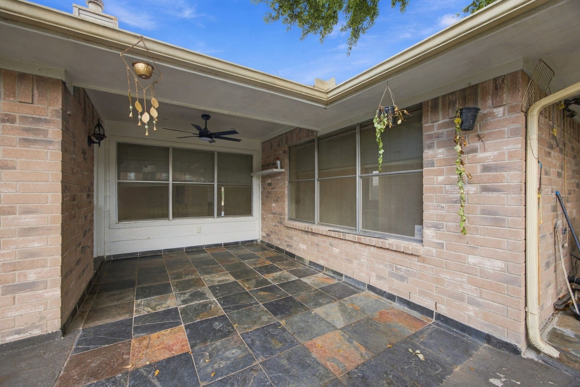 12902 Sandri Lane, Houston, TX 77077 Tucked along the rear of the home, the patio offers a comfortable setting for morning coffee or relaxing outdoors.
