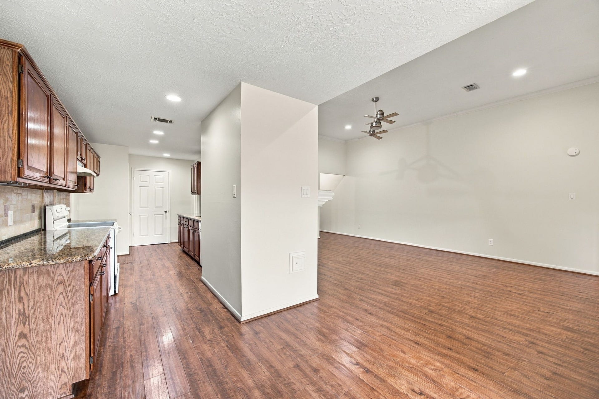 12902 Sandri Lane, Houston, TX 77077 The kitchen sits alongside the living room, keeping everyday cooking and gathering spaces conveniently connected.